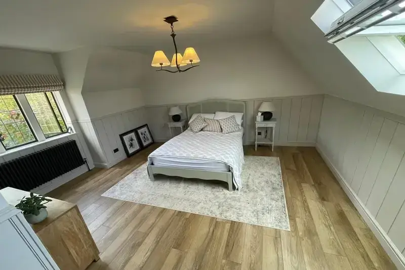 Calm, renovated bedroom completed by Sterling Renovations