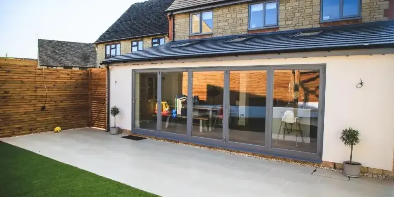 Rear house extension with glazed doors completed by Sterling Renovations